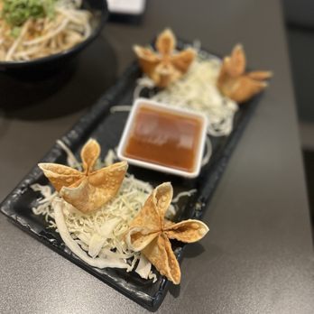 Kismet signature dishes Pork Belly Tacos, Rockfish Tacos, Yuca Fries, Kismet Burger, Pupusas